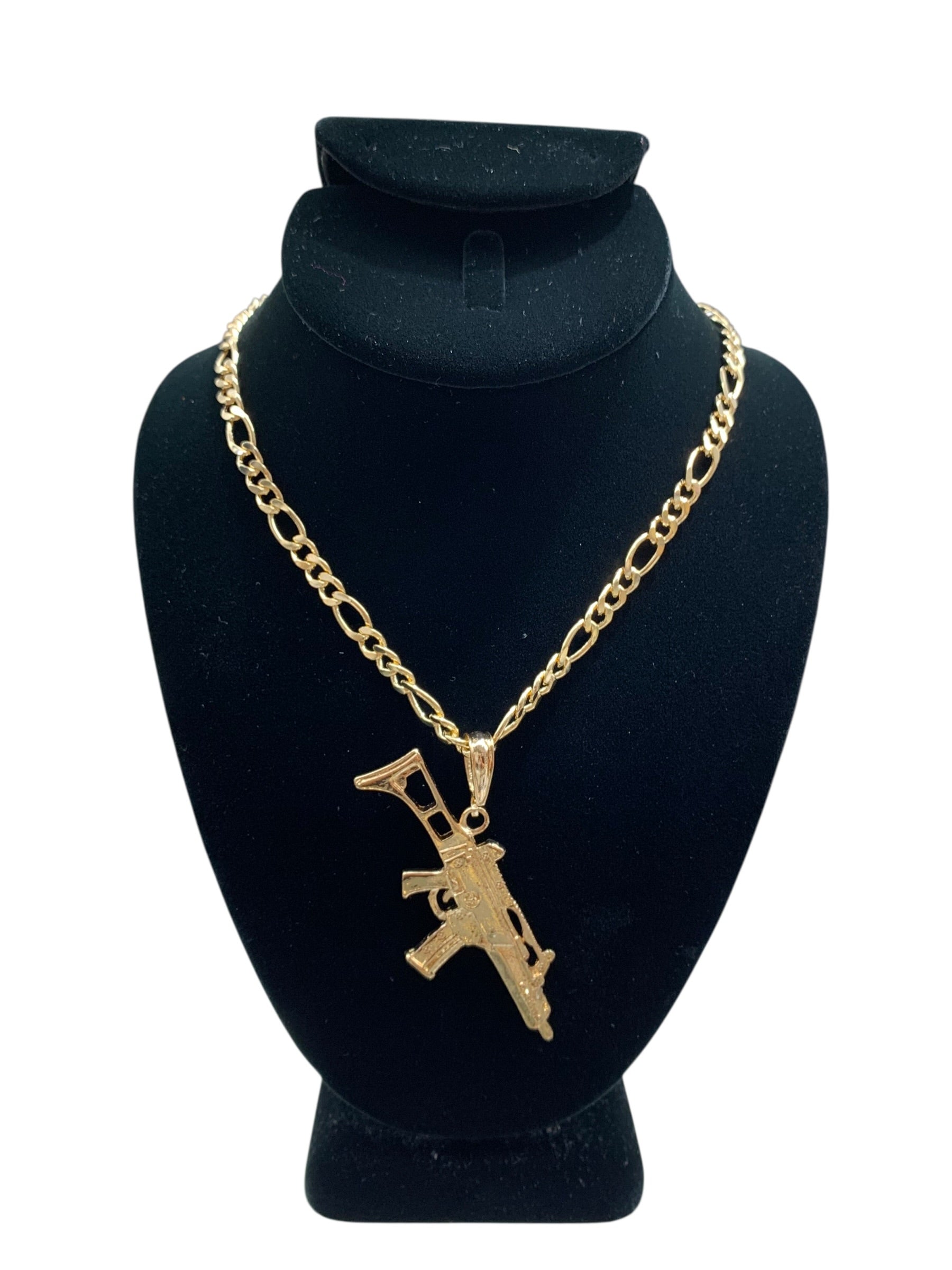 Gold Colored Chain With Gun Pendant